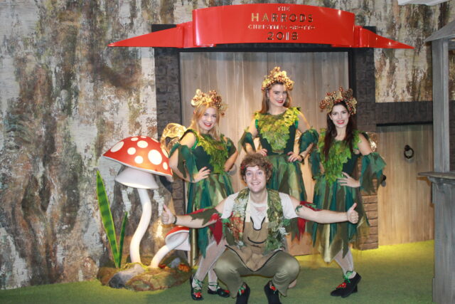 Woodland elves pose by the entrance of the toadstool grotto